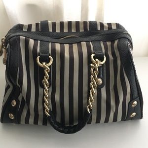 Henri Bendel iconic striped barrel handbag